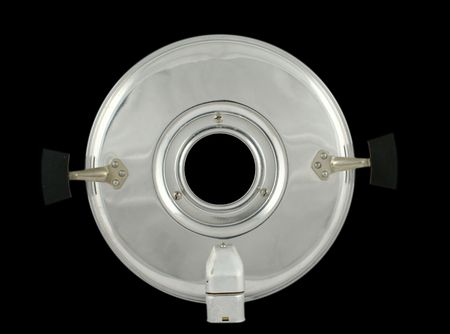 Abstract view at aluminum cover with black window in the middle of it on a black background (without reflection)の写真素材