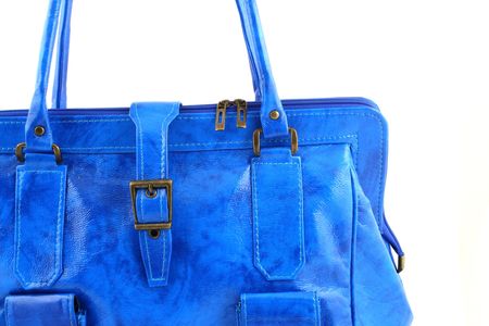 Close up at blue handbag with some straps and zippersの写真素材