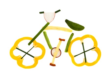 bike made from sliced vegetables and fruits isolated on whiteの写真素材