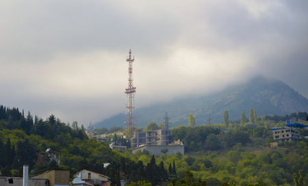 Low cloudiness over mountains and houses.Crimea.の写真素材
