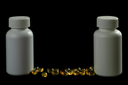 <p>Pills and capsules on a black background. Close-up.</p>の写真素材
