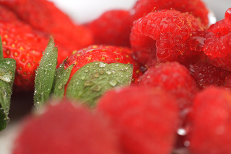 Raspberries, strawberriesの写真素材