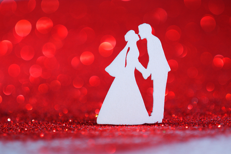 Bridal couple, background sparkling redの写真素材