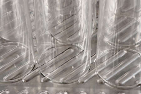 several soap covered glasses in a sinkの写真素材
