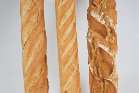 Three different types of loaves of bread
