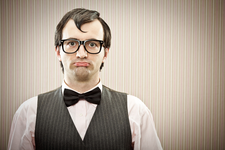 Nerd man with glasses portraitの写真素材