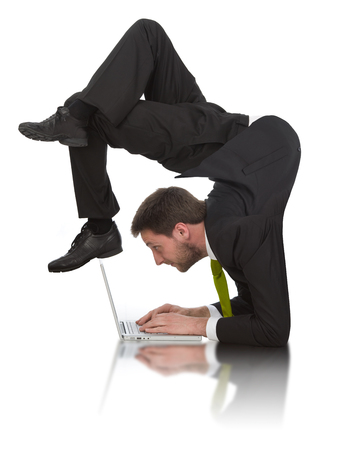 businessman work contortion with laptop isolated on white