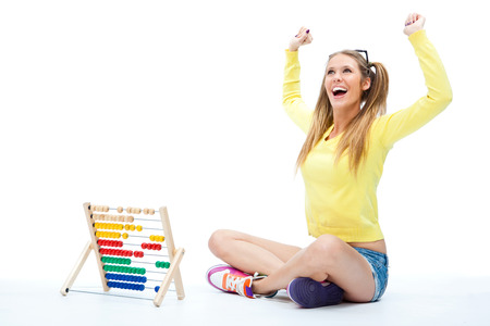 beautiful blond woman with abacus isolated on white