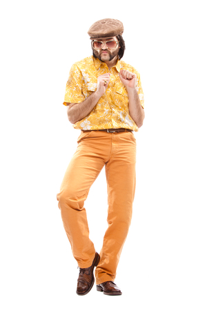 1970s vintage man with orange dress dance isolated on whiteの写真素材