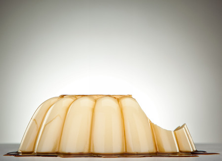 half bitten caramel puddingの写真素材