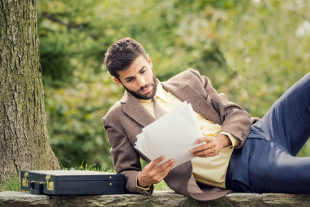Young businessman study outdoor in natureの写真素材