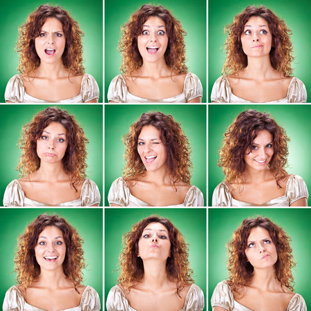 beautiful curly brunette caucasian woman collection set of face expression like happy, sad, angry, surprise, yawn on green backgroundの写真素材