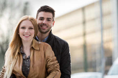 couple of man and woman urban city portraitの写真素材