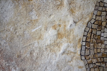Mosaic on the right side of the stone wallの写真素材