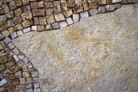 Mosaic on the left side of the stone wallの写真素材