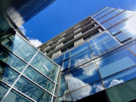 View of modern glass and steel buildingの写真素材