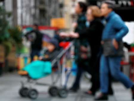 Family on a walk,blur backgroundの写真素材