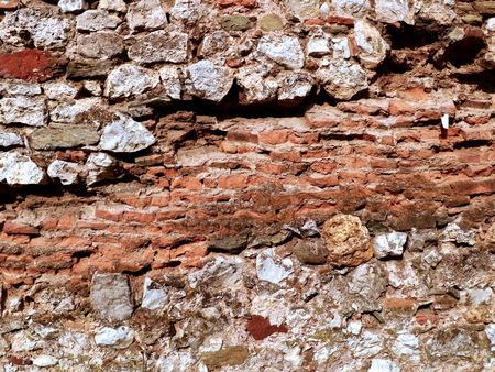 Old wall with stones and bricks