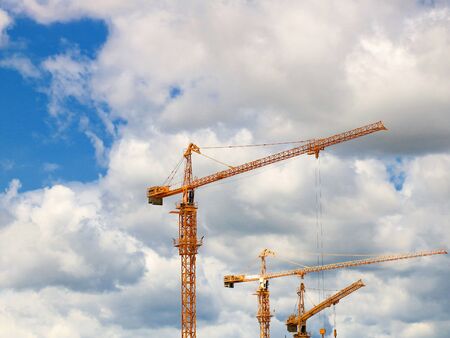 Cranes on the construction sitesの写真素材