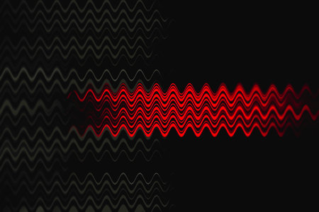 Abstract red and yellow swirls on a black backgroundの写真素材