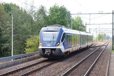 CAF civility local commuter train at station Den Haag Mariahoeve at The hague, the Netherlands