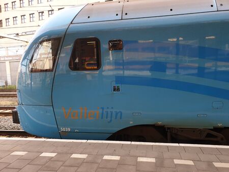 Blue local commuter train type Flirt of the Valleilijn runned by Connexxion at station Amersfoort
