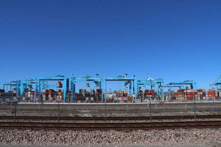 Blue cranes at the APM container terminal in the Maasvlakte Harbor in the Port of Rotterdam
