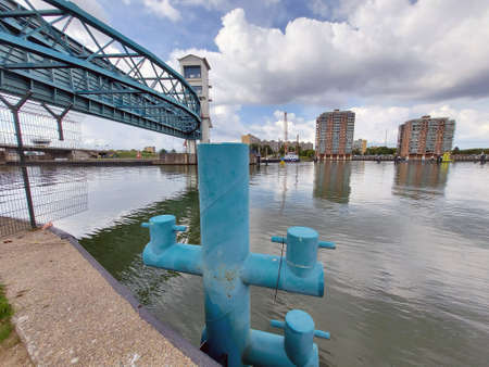 Two huge water barriers at Krimpen aan den IJssel as Hollandsche IJsselkering in the river Hollandsche IJssel with sluice to protect part of Holland agains Floodingのeditorial素材