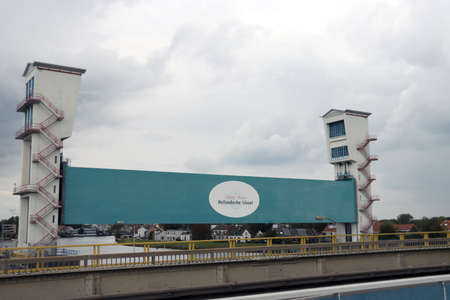 Two huge water barriers at Krimpen aan den IJssel as Hollandsche IJsselkering in the river Hollandsche IJssel with sluice to protect part of Holland agains Floodingのeditorial素材