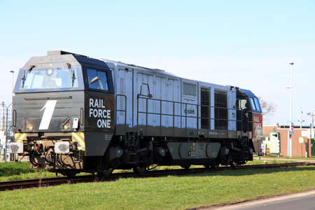 Trains and cranes with Sea containers stored harbor of Rotterdam in the Netherlandsのeditorial素材