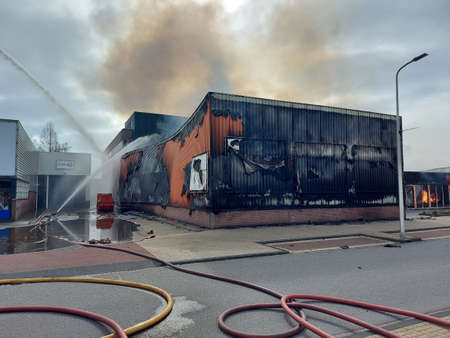 Extreme fire in furniture shop at the Lylantse Baan in Capelle aan den IJssel on march 21st 2021 in the Netherlands. Not only shop was destroyed, the office building behind it was also burnedのeditorial素材
