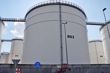 Tank full of crude oil, fuels or chemicals in the port terminal in Botlek Rotterdam in the Netherlandsのeditorial素材