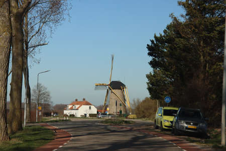 Windmill 'De Bommelaer' in the town of Den Bommel at island of Goeree Overflakkeeのeditorial素材