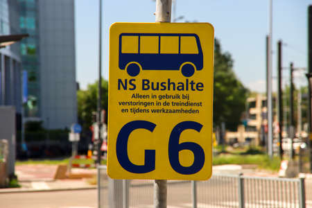 Sign at bus stop for replacement transport in case of disruption of the train service for NS at Utrecht Centraalのeditorial素材