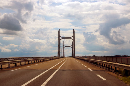 Suspension steel bridge named Eilandbrug at Highway N50 at Kampen in the Netherlandsのeditorial素材