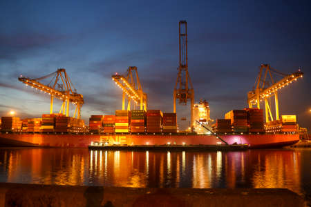 Cranes at Maasvlakte Container terminal during sunset in the port of Rotterdam