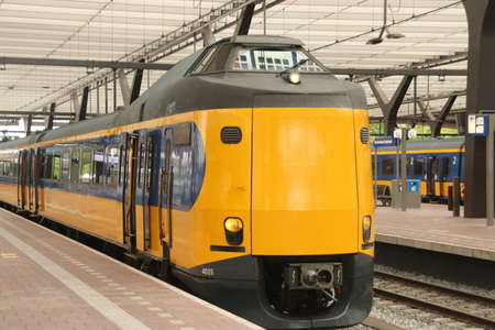ICM intercity train named Koploper along platorm at Rotterdam Central Station.