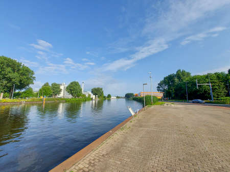 The Schie in Rotterdam with the Van Nelle factory and the prison in the west of the cityのeditorial素材