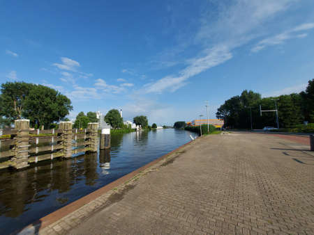 The Schie in Rotterdam with the Van Nelle factory and the prison in the west of the cityのeditorial素材