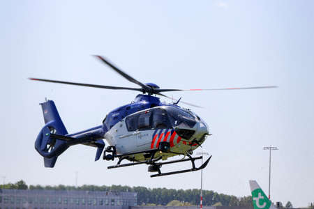 Airbus police helicopter is lifting off at Rotterdam The Hague Airport in the Netherlans