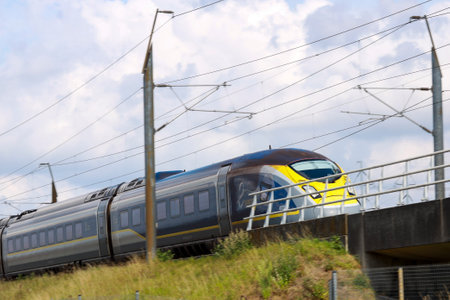 Eurostar international train between Amsterdam and London at Benthuizen railroad in the Netherlandsのeditorial素材