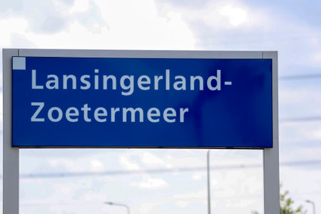 Name sign on the platform of railway station Lansingerland Zoetermeer in the Netherlandsのeditorial素材