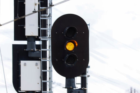 Orange warning sign at platform on railway station Lansingerland-Zoetermeer the Netherlandsのeditorial素材