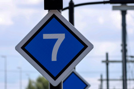 Sign to indicate where to stop with how many trains on the platform at station Lansingerland Zoetermeer in the netherlands.のeditorial素材