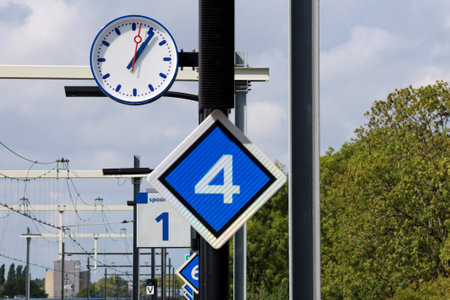 Sign to indicate where to stop with how many trains on the platform at station Lansingerland Zoetermeer in the netherlands.のeditorial素材
