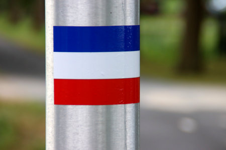 flags upside down and protest signs on lightning pole in Moordrecht with protest farmers signs in the Netherlandsのeditorial素材