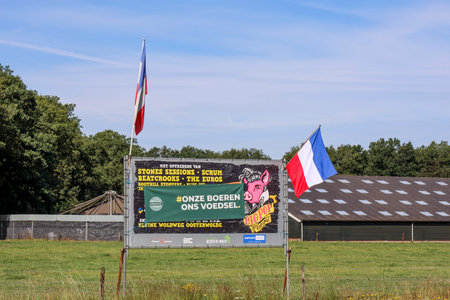flags upside down in Wezep and Oldebroek with protest farmers signs in the Netherlandsのeditorial素材