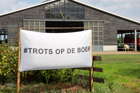 Banner with text Proud of the farmer at a farm in Alphen aan den Rijn in South Holland the Netherlandsのeditorial素材