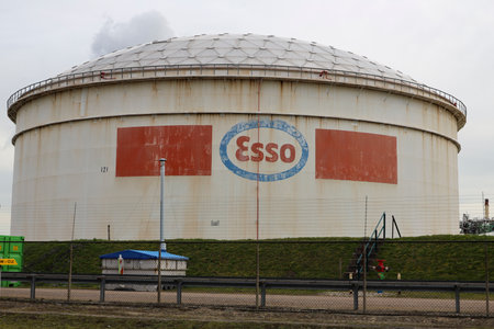 Oil tank with Esso at Exxonmobil refinery in Rotterdam the Netherlandsのeditorial素材