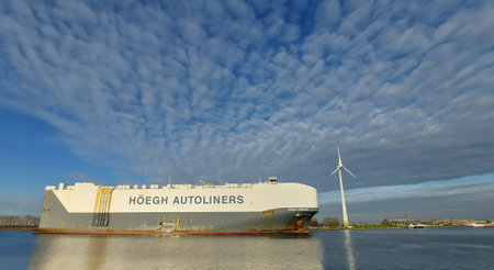Hoegh Tracer freighter for car transport on the North Sea Canal at Spaarnwoude on its way to Westpoort harbor in Amsterdam in the Netherlandsのeditorial素材